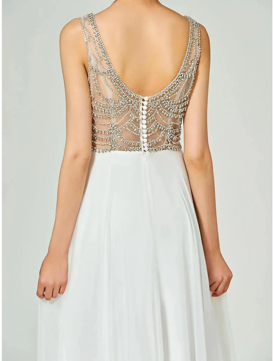 Abito da sera a trapezio con schiena scoperta, lungo fino al pavimento, senza maniche, scollo a V, in chiffon con strass